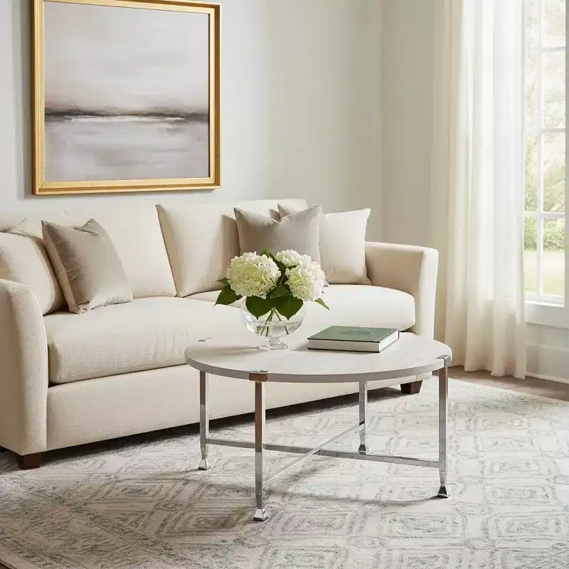 HomeRoots 36 White and Silver Metal Round Cross Legs Coffee Table
