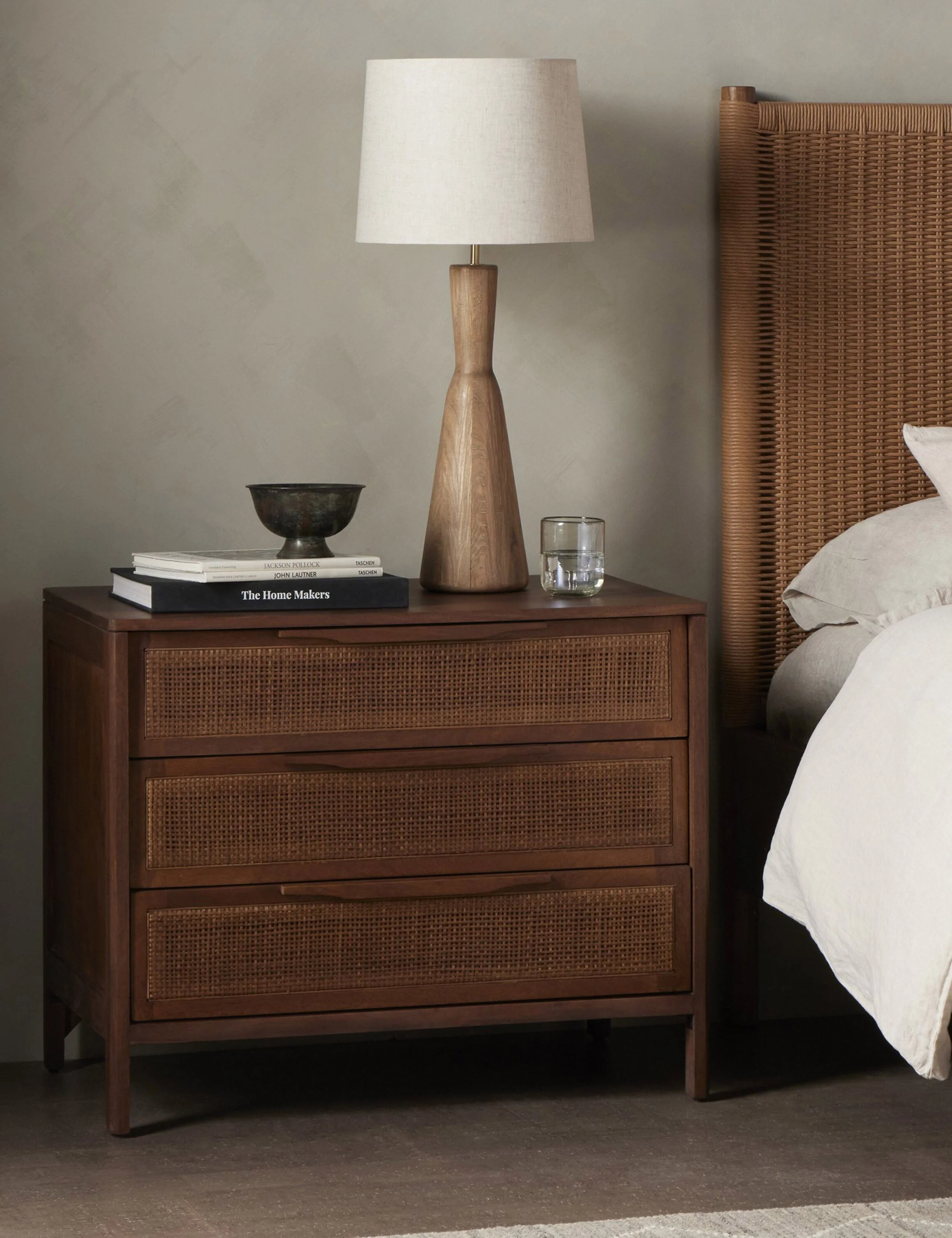 Nightstand Clean lines and an airy profile bring a cool coastal feel to the nightstand. We love the classic touch of the woven cane front for its