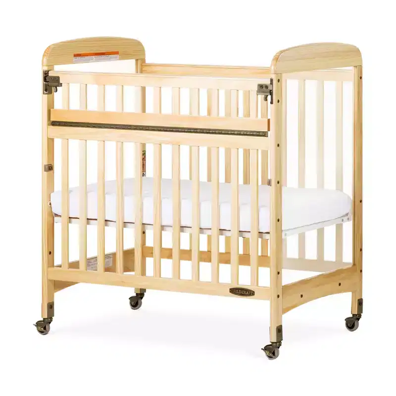 Wooden Compact Portable Crib, 2 Easy Roll Locking Wheels, Durable Wood Construction, Fits Through Doorways (Natural)
