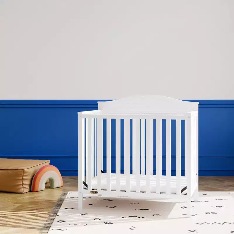 Graco Stella 4-in-1 Convertible Mini Crib with Mattress