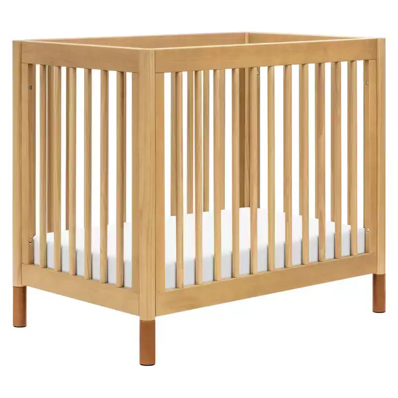 4-in-1 Convertible Mini Crib with Interchangeable Feet