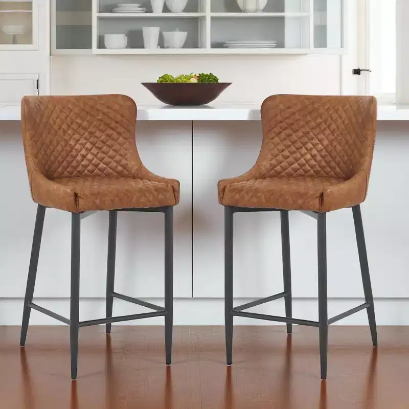 HomeRoots Set of Two 26 Orange and Black Metal and Faux Leather Low Back Counter Height Bar Chairs