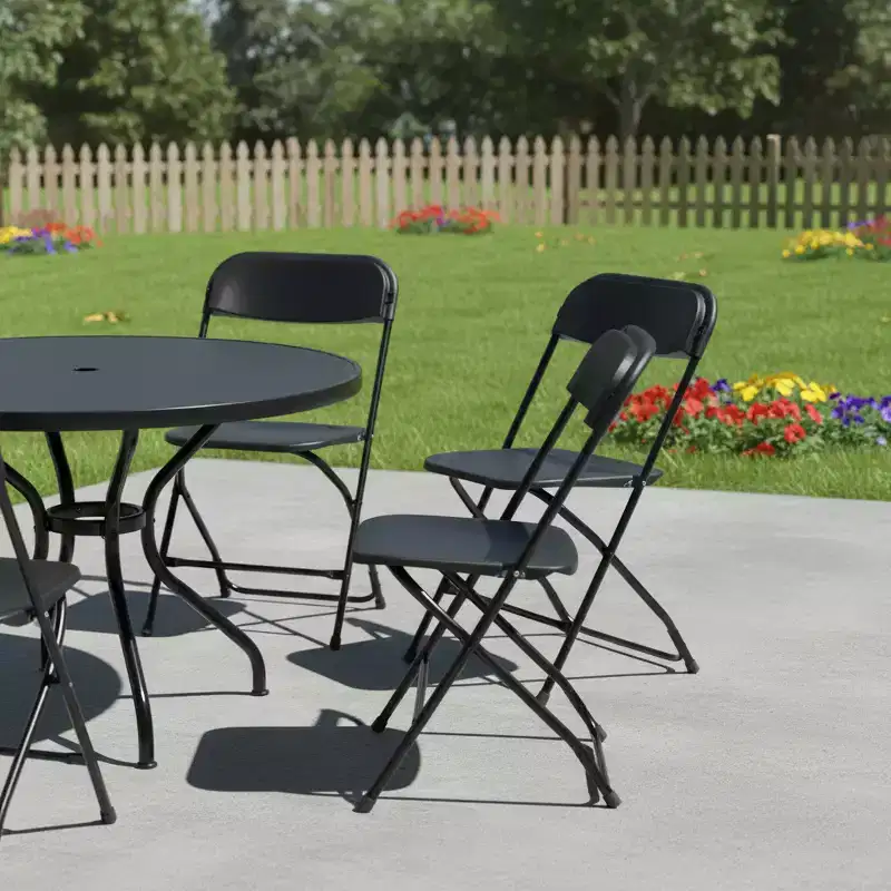 HomeRoots Set of Four Black Metal Outdoor Folding Stacking Dining Chairs