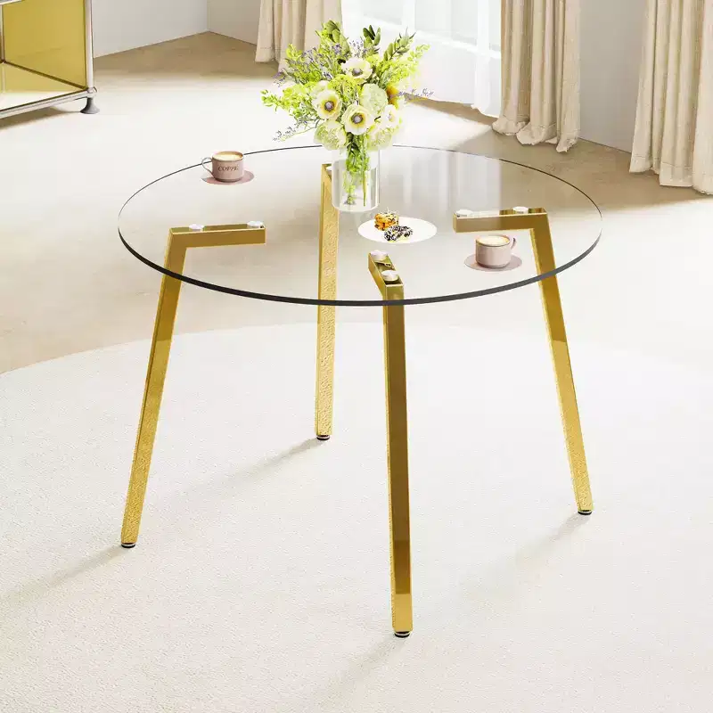 Modern minimalist style circular transparent tempered glass table, tempered glass tabletop, golden metal legs