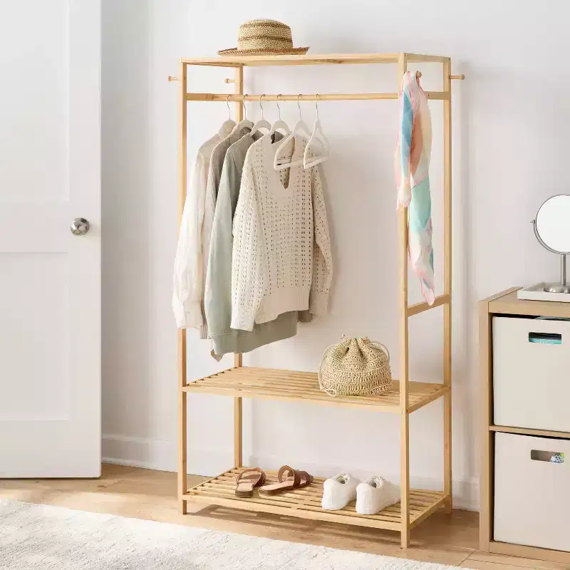 Bamboo clothing rack with shelves