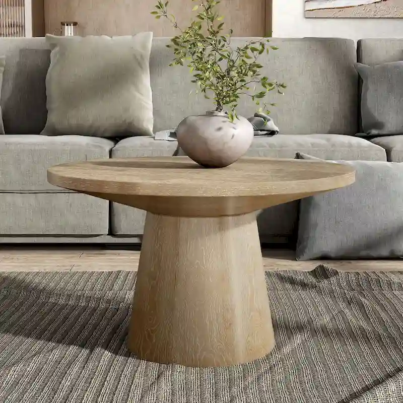 Modern round coffee table with solid wood base
