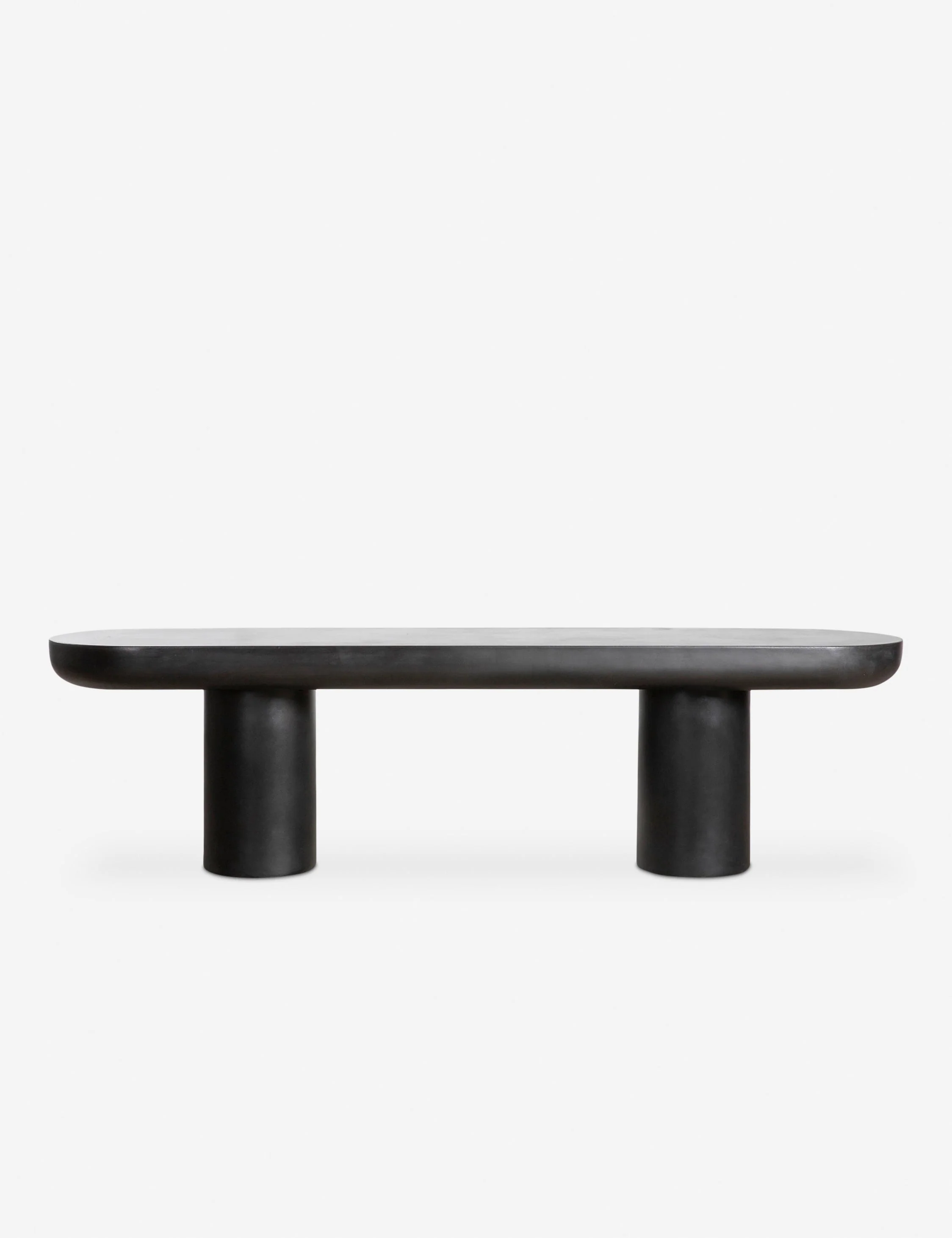 / Outdoor Bench - Sculptural lines soften and offer dramatic appeal to the sleek black-finished cement construction of this collection