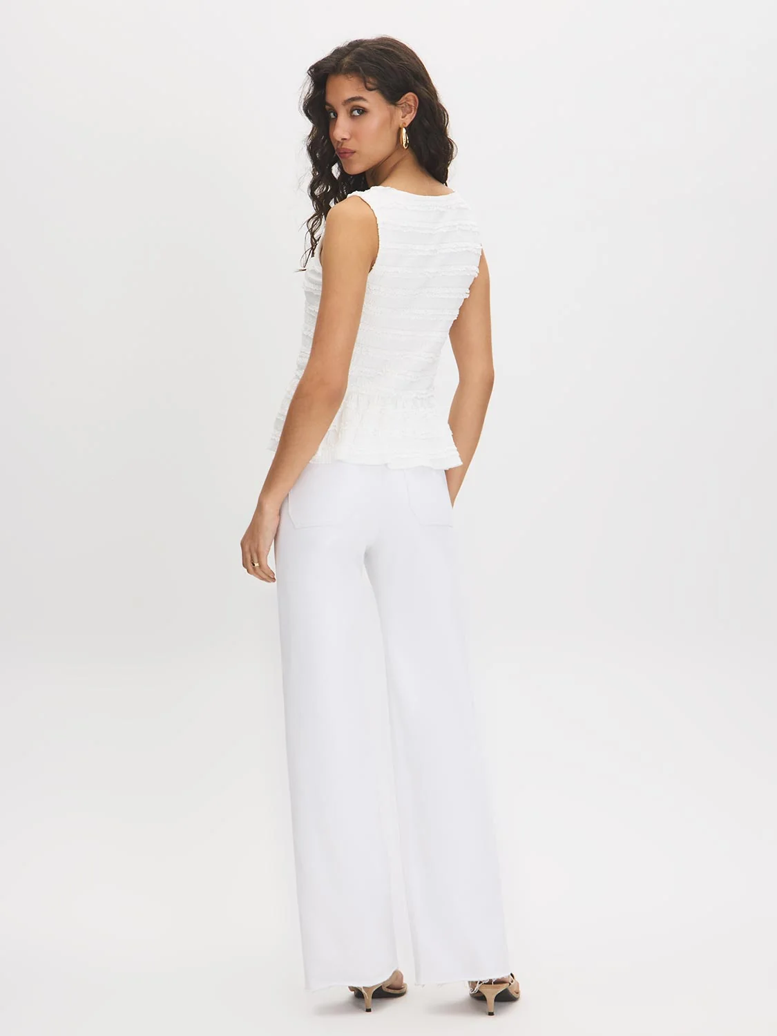 Sleeveless Textured Peplum Top