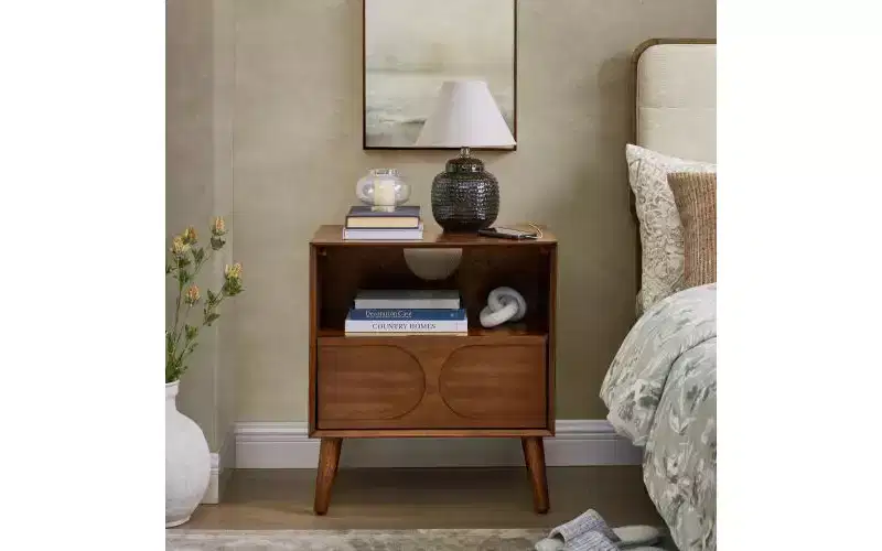 JVNOXK Mid-century modern-style recessed nightstand with open storage and drawers, featuring power outlets and four solid wood legs, walnut finish