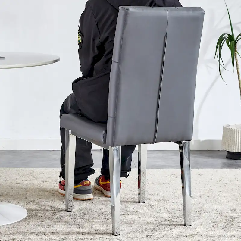 4 piece set of gray armless dining chairs brings a touch of elegance and mystery to the dining area with its deep gray tone