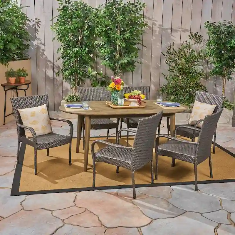 Elderon Outdoor 7 Piece Acacia Wood Dining Set with Stacking Wicker Chairs by Christopher Knight Home