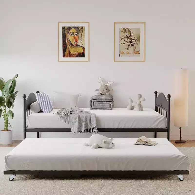 Twin Daybed with Trundle  Stylish Metal Sofa Bed Frame, Pop-Up Trundle, Perfect for Any Space