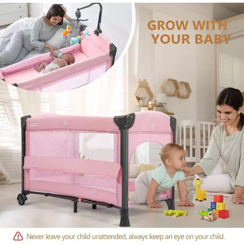 JOYMOR Baby Bedside Bassinet, Baby Bassinet, Pack n Play Convert Playpen, Quick Foldable Travel Bed, Wheels & Brake, Carry Bag for Boys Girls (Pink)