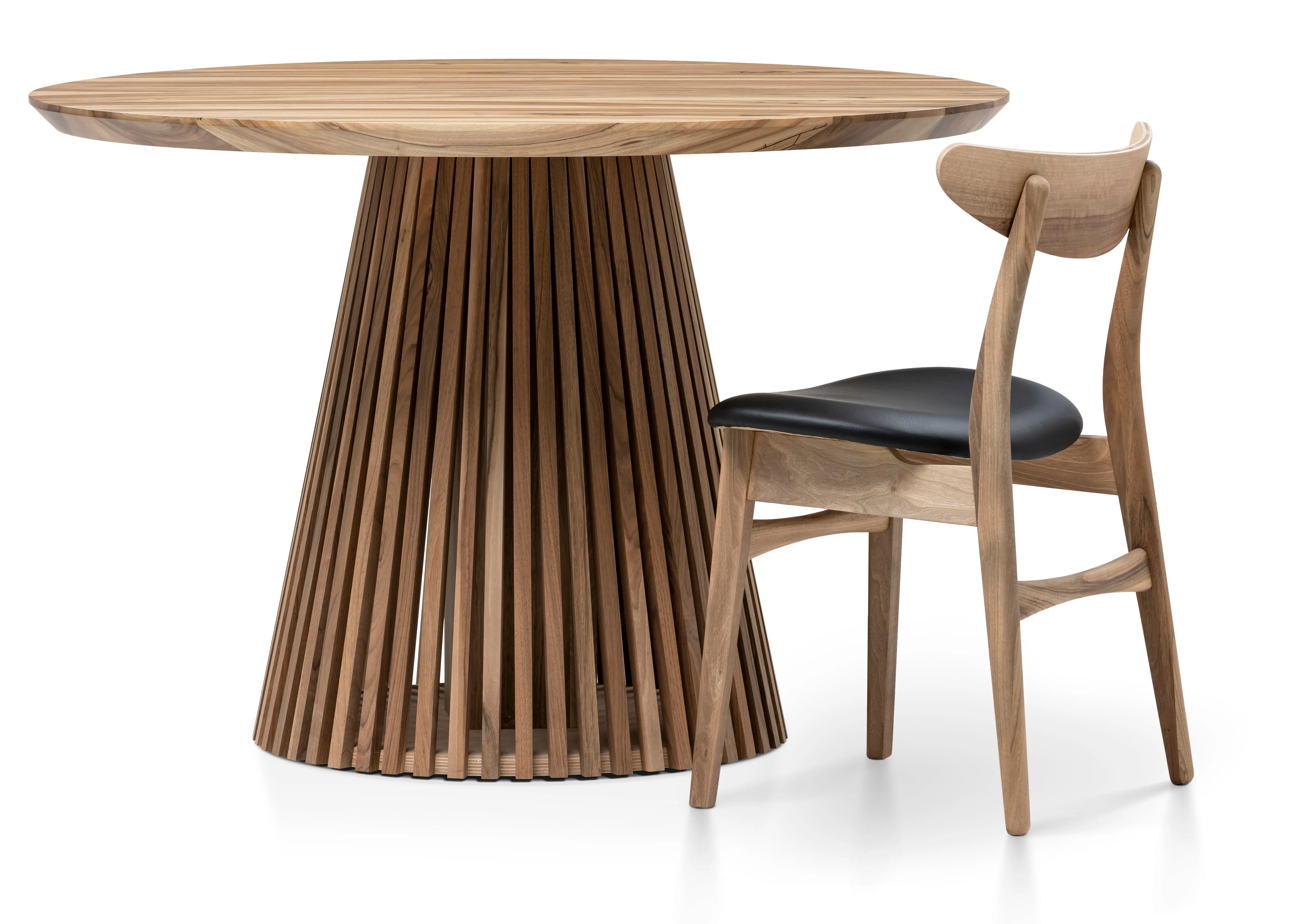 Round Walnut Dining Table - Introducing our handcrafted Round Walnut Dining Table with pipe legs - a stunning addition to any