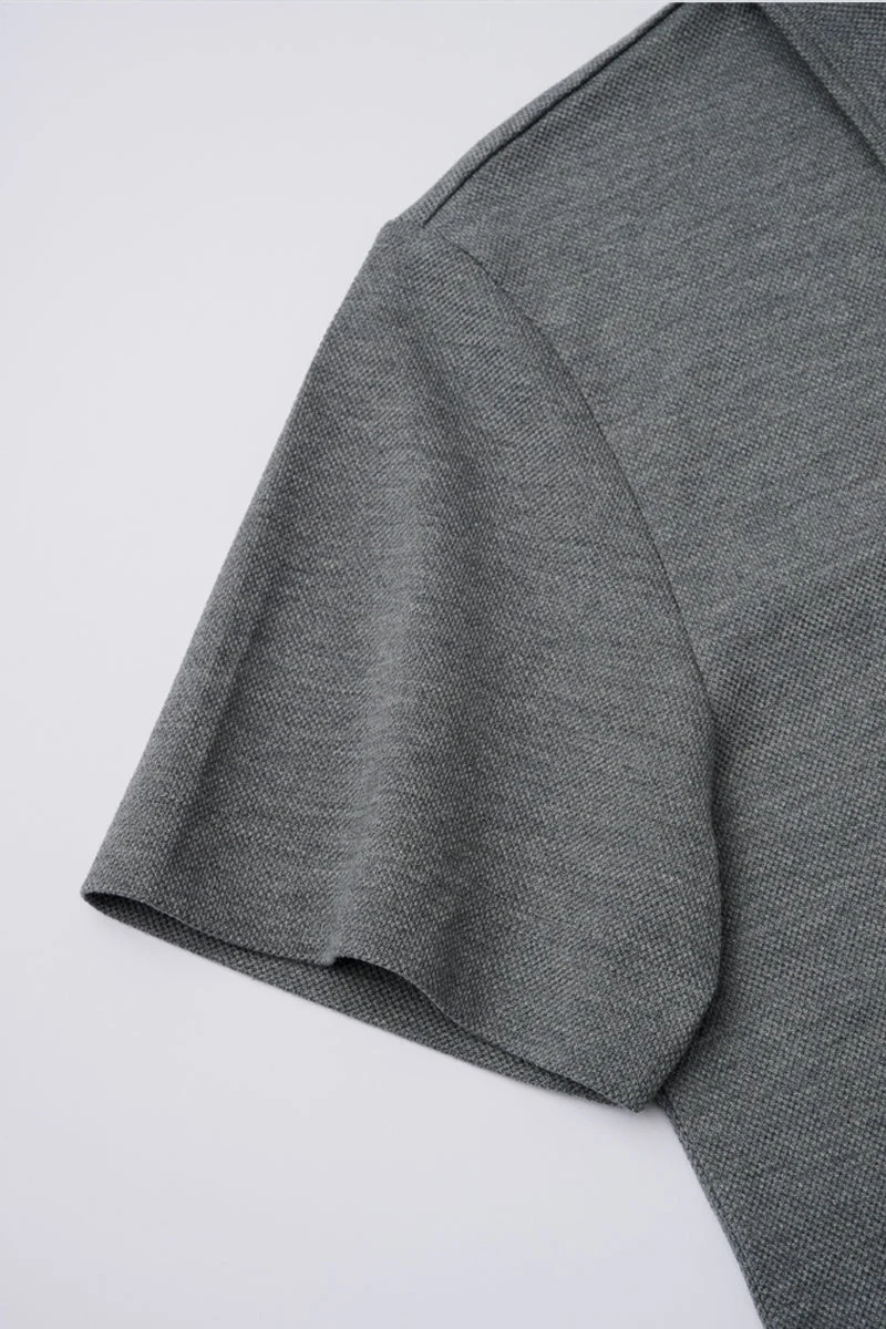 Waffle-Knit Buttonless Polo – Denim Blue