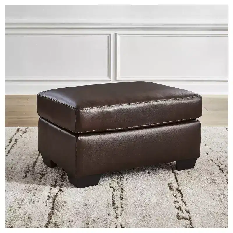 Signature Design by Ashley Santorine Leather Ottoman in Dark Brown