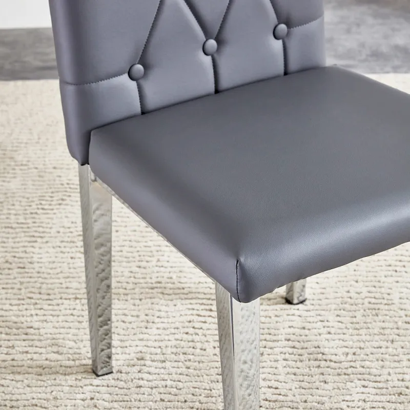 4 piece set of gray armless dining chairs brings a touch of elegance and mystery to the dining area with its deep gray tone